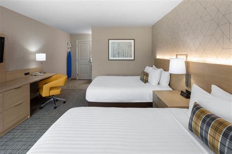 Rooms available at Days Inn & Suites by Wyndham .